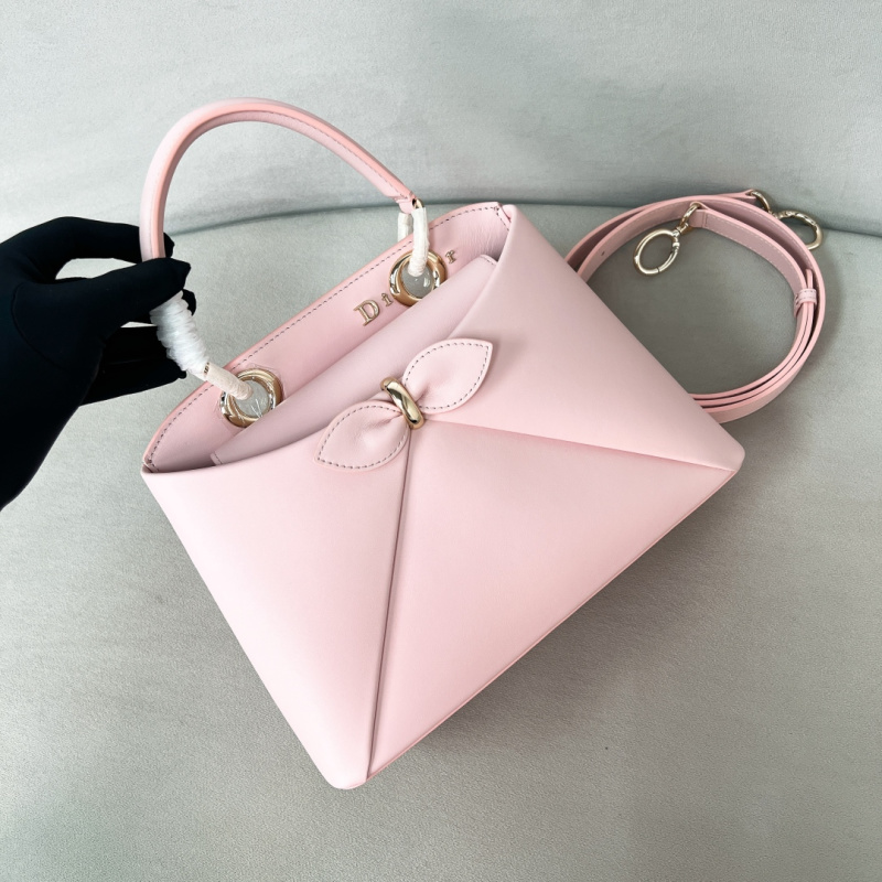 Женская кожаная сумка Dior Cigale розового цвета с бантом