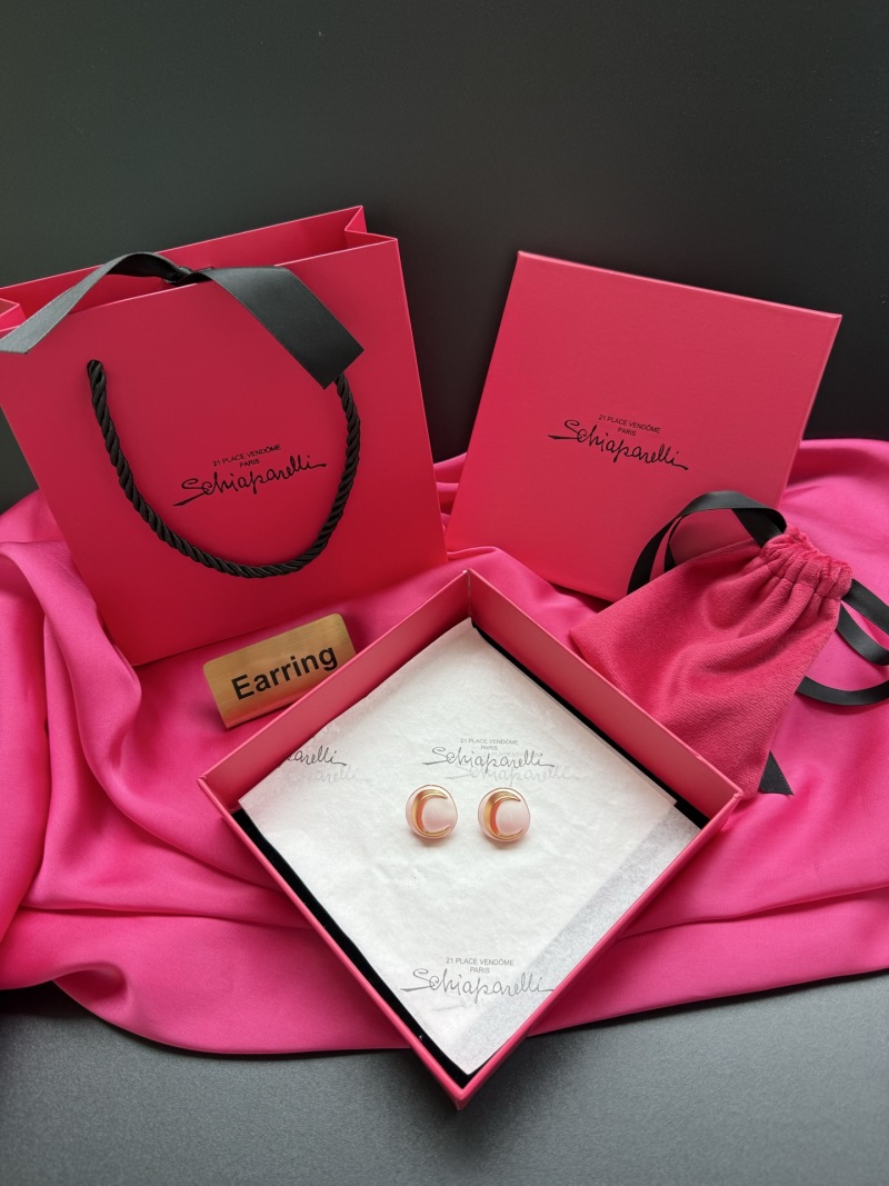 Серьги-круглые с золотым ободком Schiaparelli