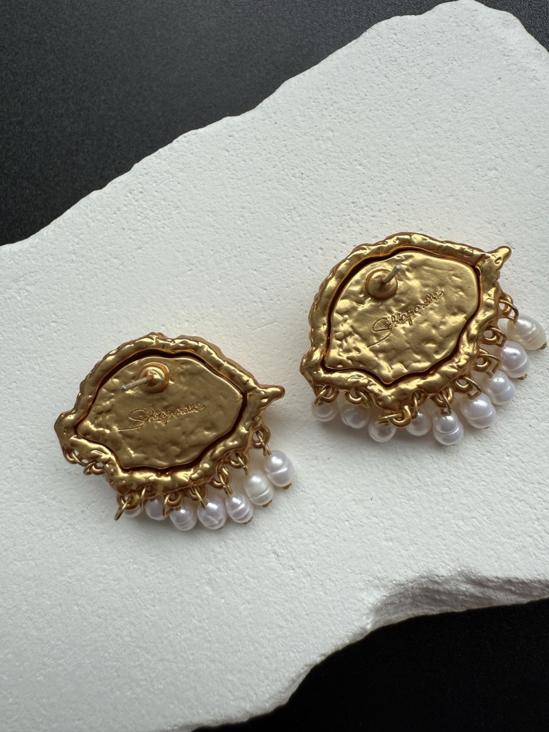 Серьги в виде глаз с жемчугом Schiaparelli