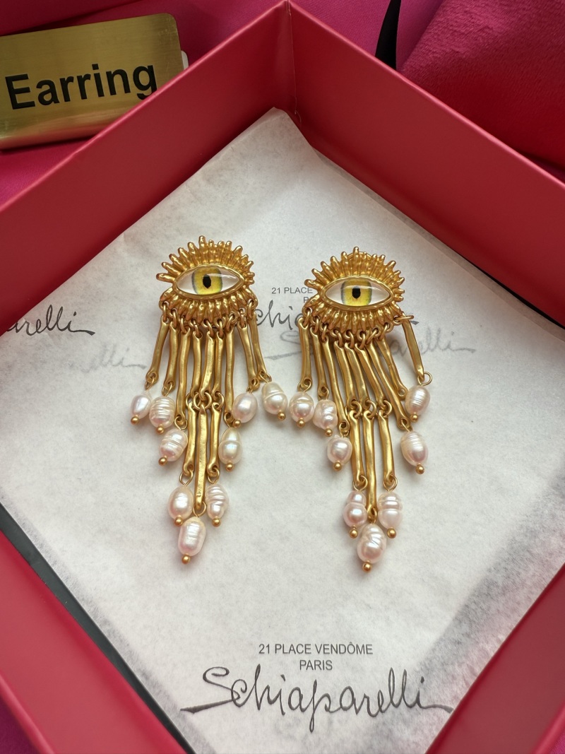Серьги Schiaparelli с глазом и жемчугом