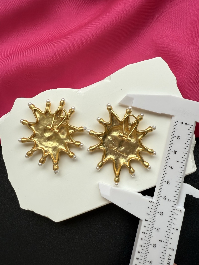 Серьги в виде солнца с кристаллами Schiaparelli