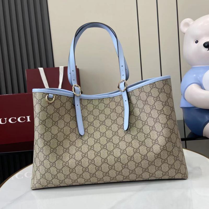 Сумка-тоут Gucci с монограммой и голубыми ручками