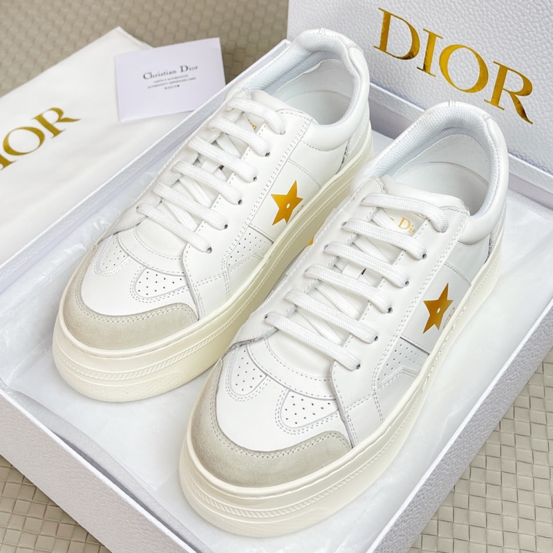 Белые кроссовки с золотой звездой Dior