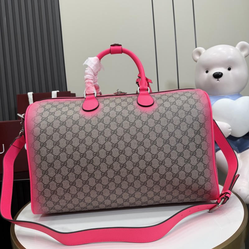 Портфель Gucci с монограммой и розовой отделкой