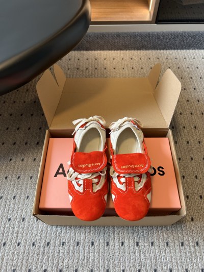 Женские кроссовки Acne Studios оранжевого цвета