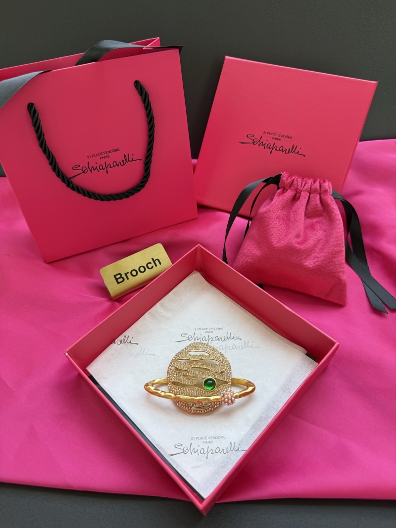 Брошь Schiaparelli
