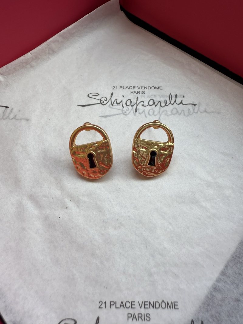 Серьги в виде замков Schiaparelli