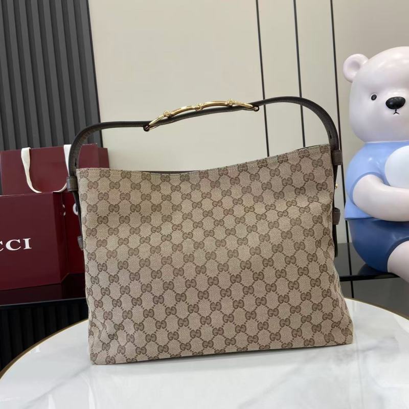 Сумка Gucci с монограммой и ручкой