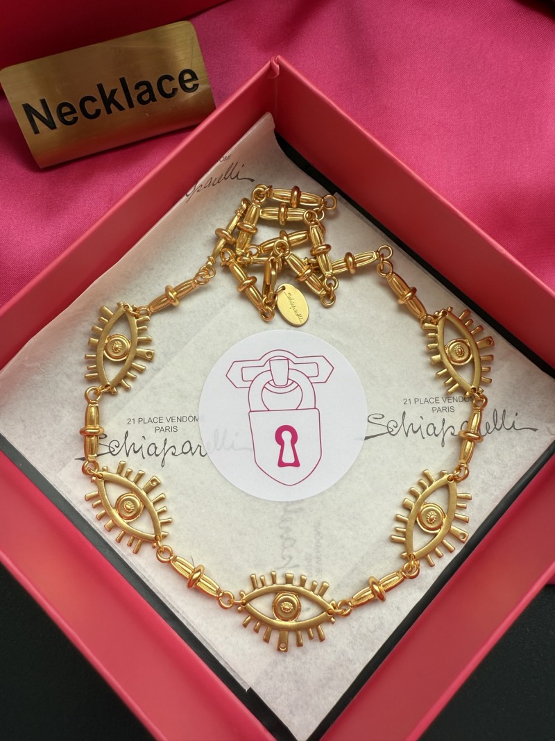 Золотистое колье с глазами Schiaparelli