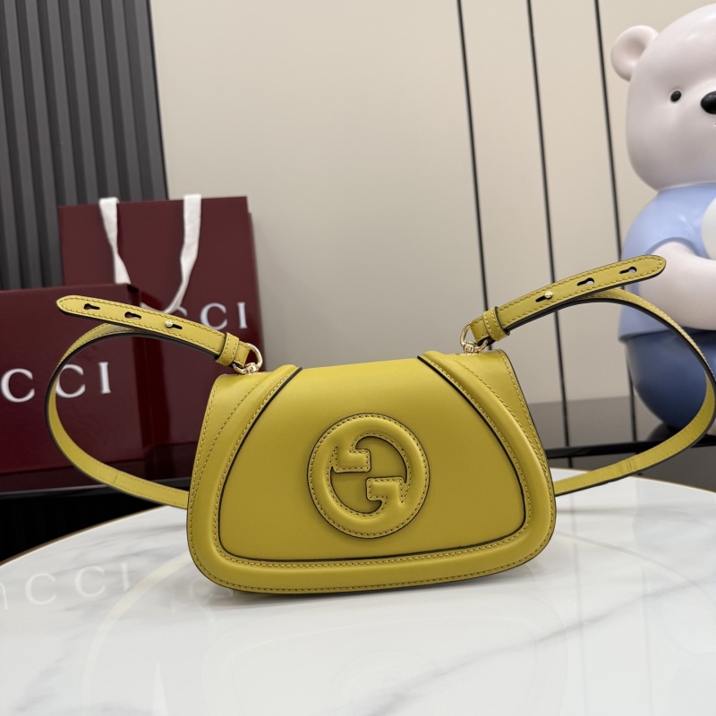 Желтая сумка Gucci с логотипом