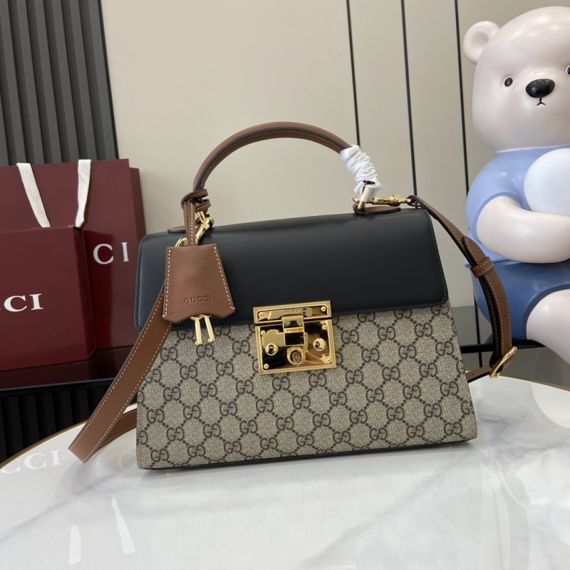 Сумка Gucci с монограммой и замком