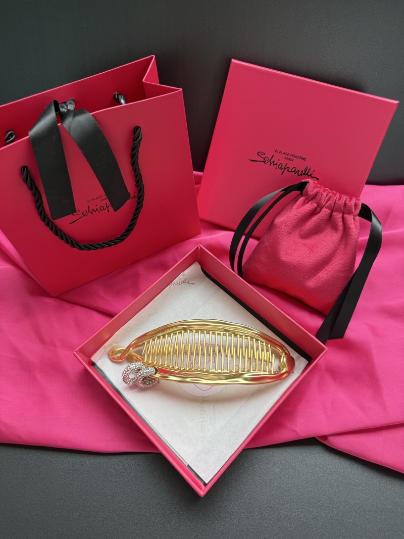 Брошь в виде золотой раковины с кристаллами Schiaparelli