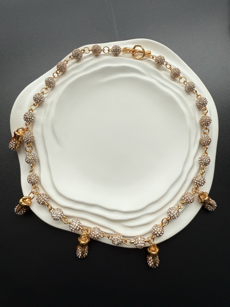 Наручное колье с подвесками Schiaparelli