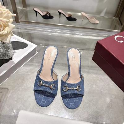 Женские мюли Gucci с ремешком в виде подковы