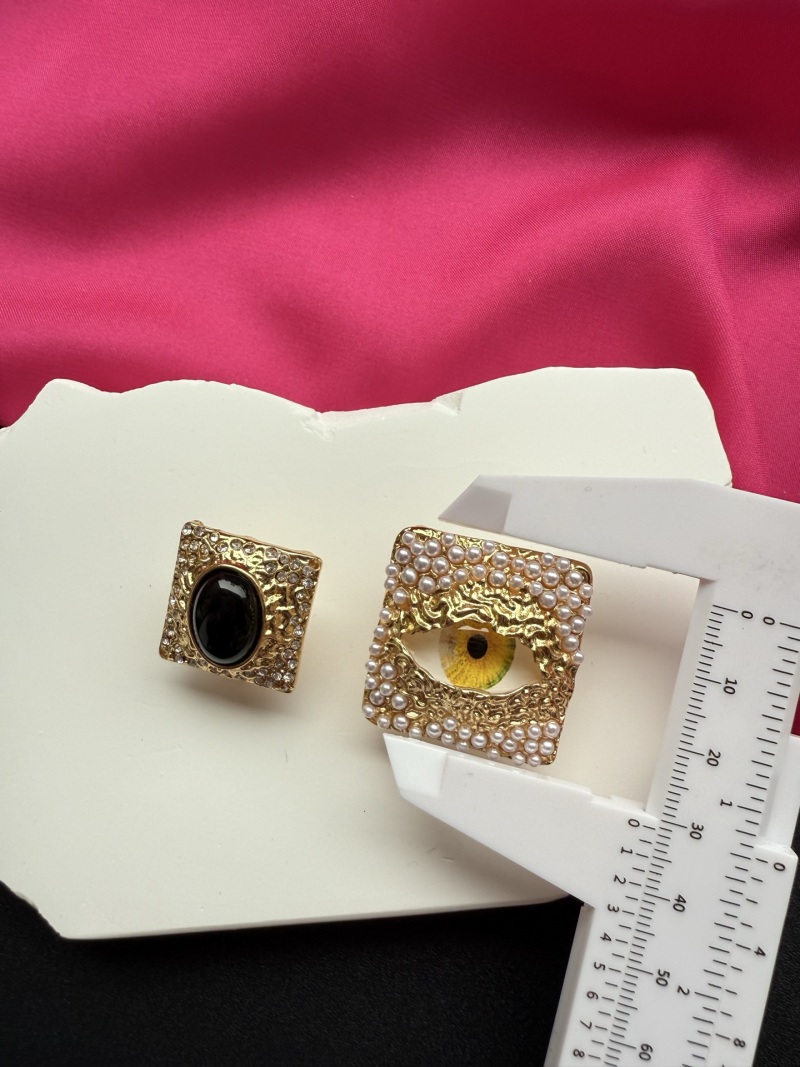 Серьги с глазом Schiaparelli