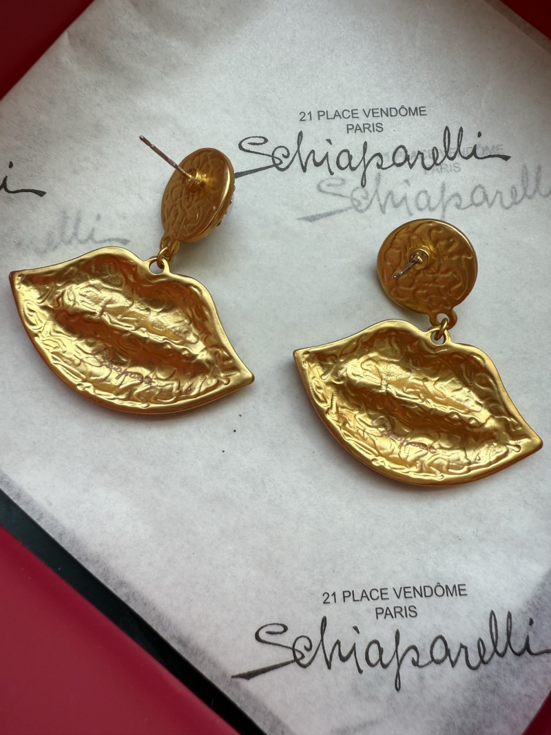 Серьги в виде губ с жемчугом Schiaparelli