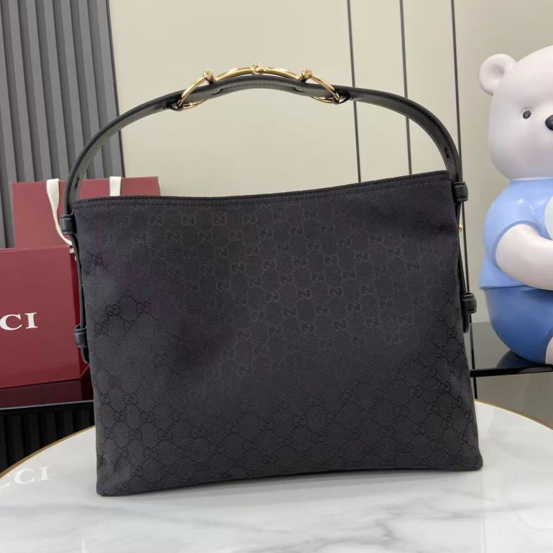 Сумка Gucci с монограммой и ручкой