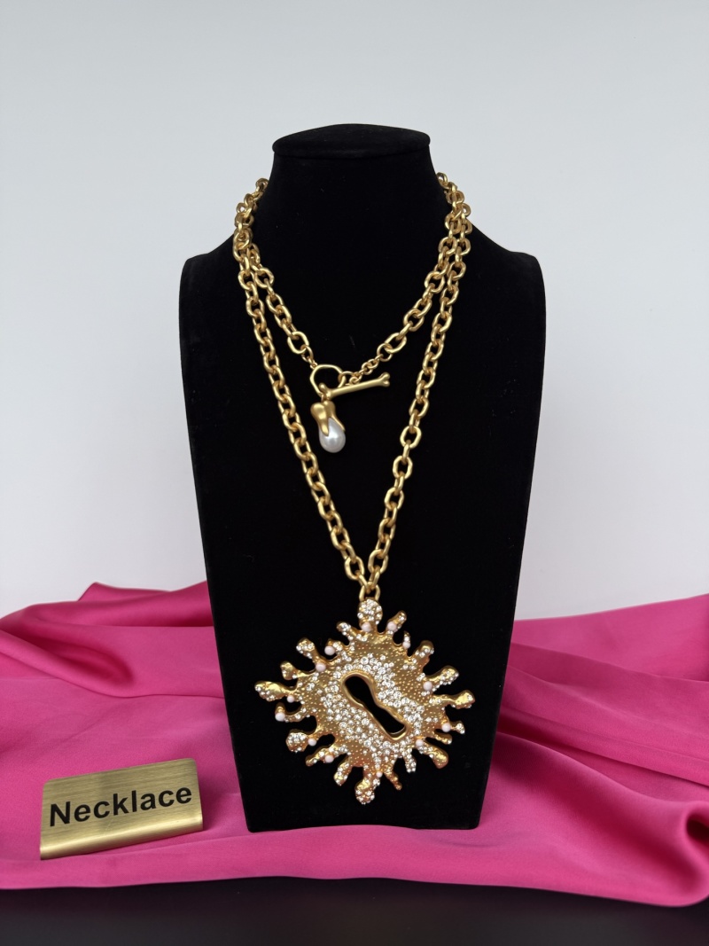 Золотистое колье с кристаллами и жемчугом Schiaparelli