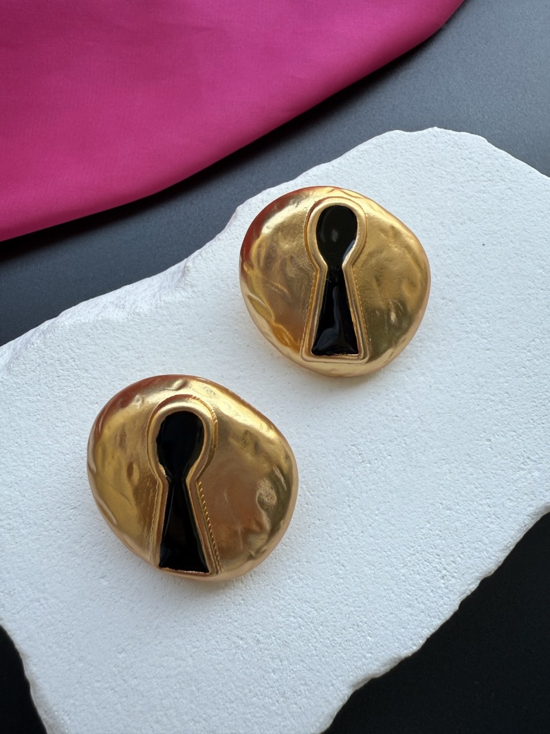 Серьги в форме ключа Schiaparelli