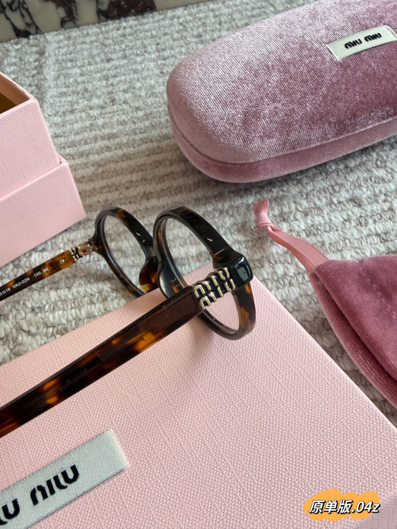 Очки Miu Miu круглые в роговой оправе
