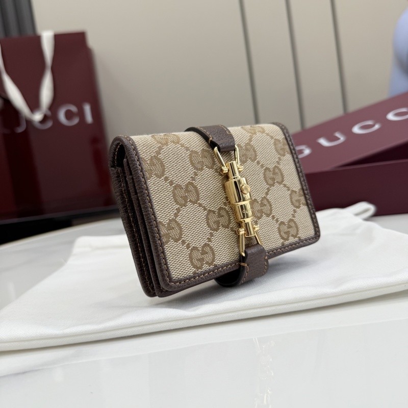 Портмоне Gucci с монограммой и замком