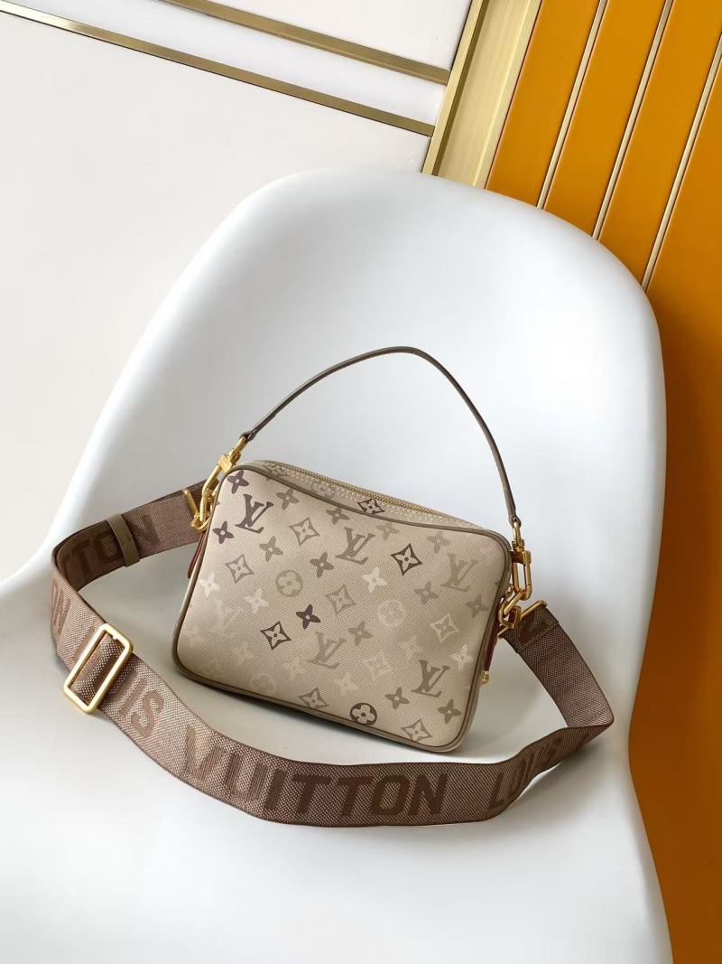 Сумка Monogram Heritage с принтом и ручками Louis Vuitton