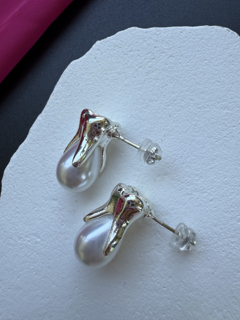 Серьги Schiaparelli