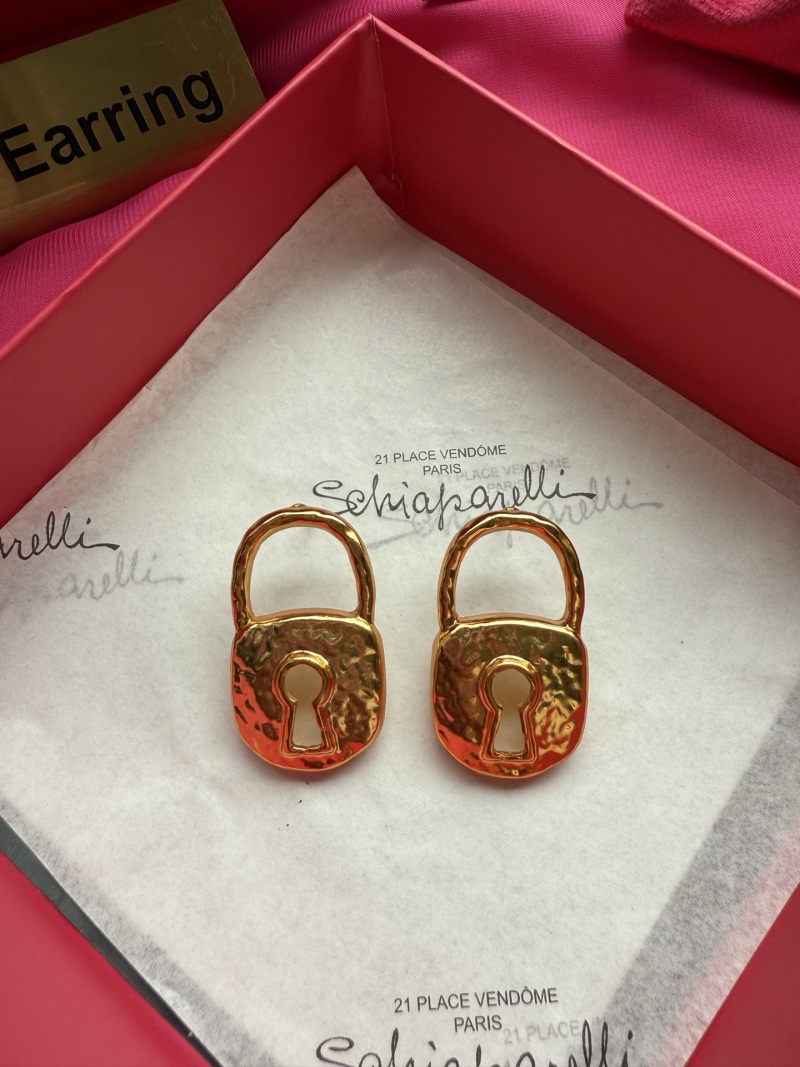 Серьги в форме замков Schiaparelli