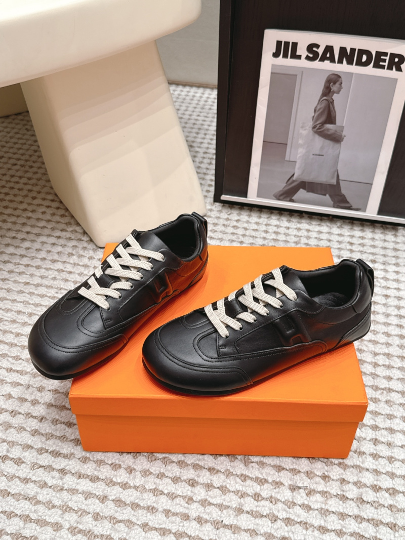 Женские черные кожаные кроссовки с белой шнуровкой Hermès