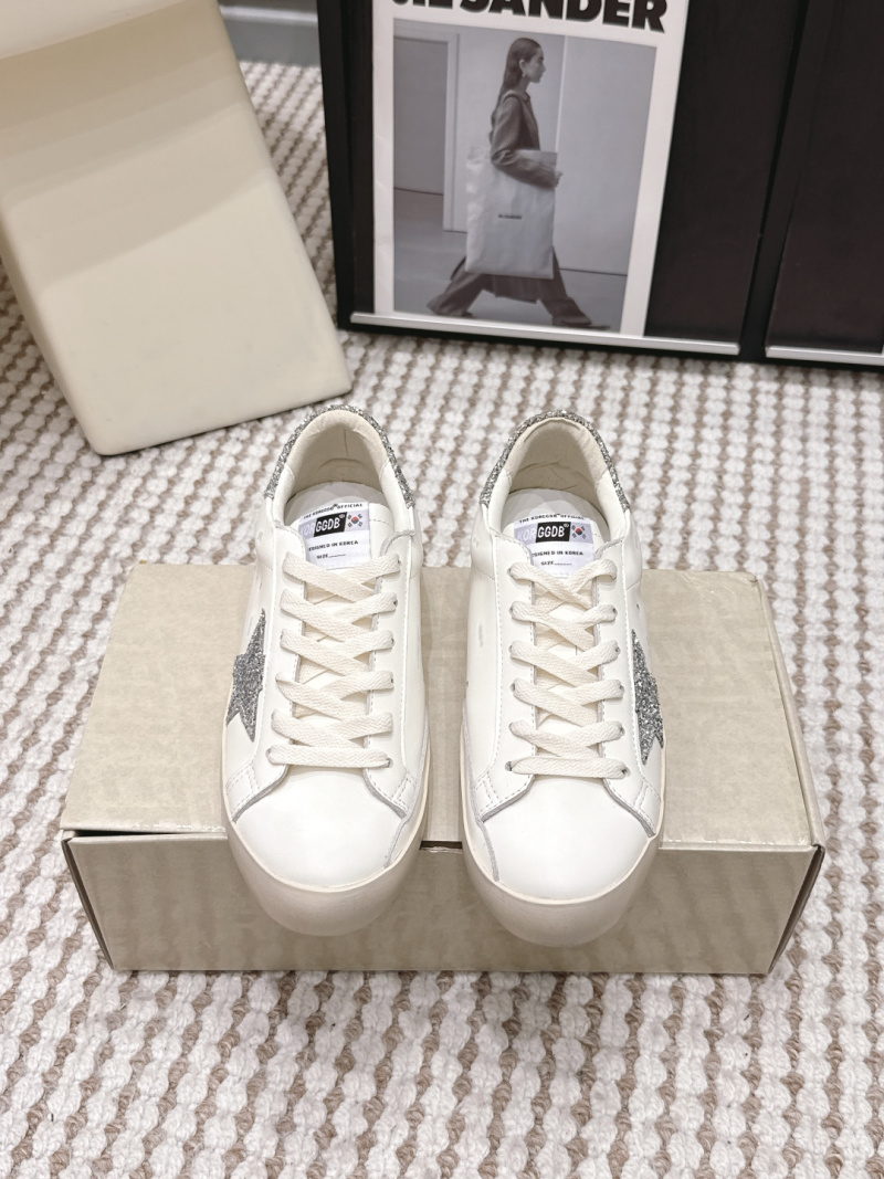 Белые кеды с звездой Golden Goose