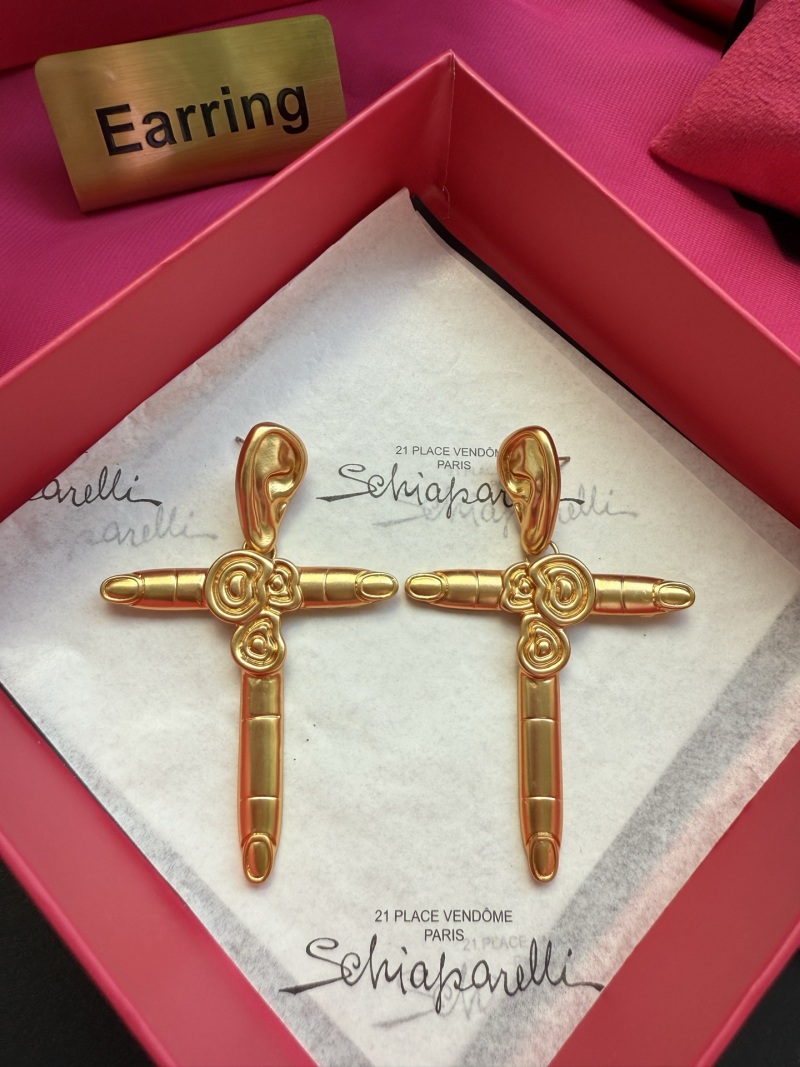 Серьги в форме креста Schiaparelli