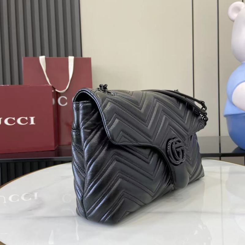 Черная сумка Gucci с кисточкой