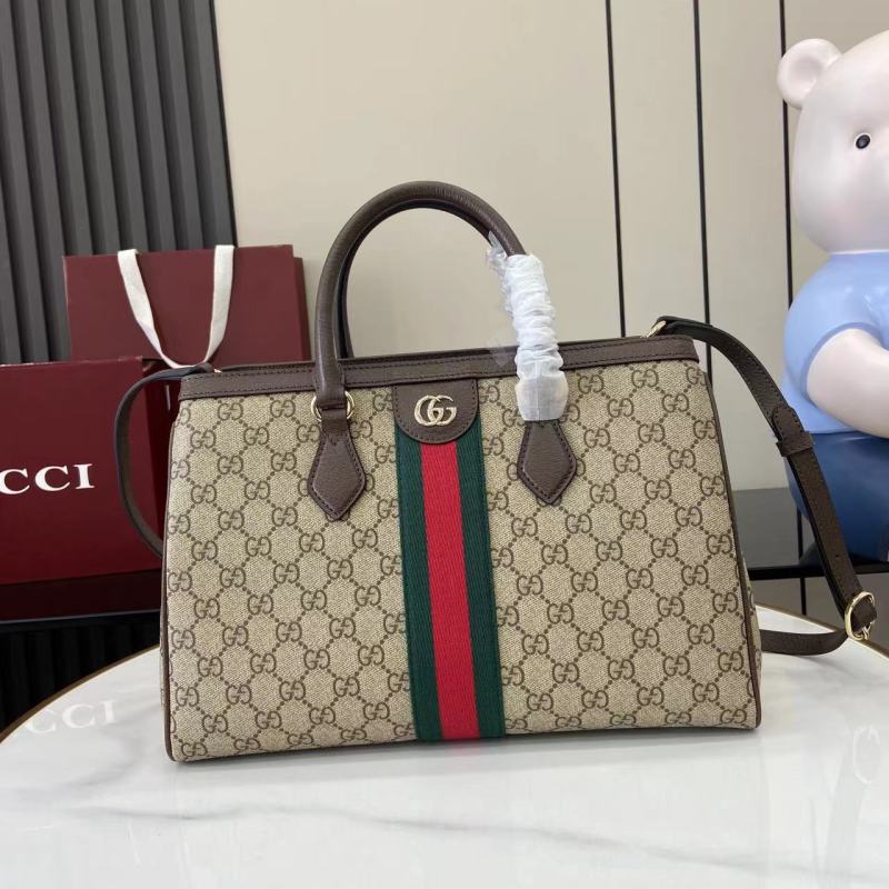 Сумка Gucci с монограммой и полосой