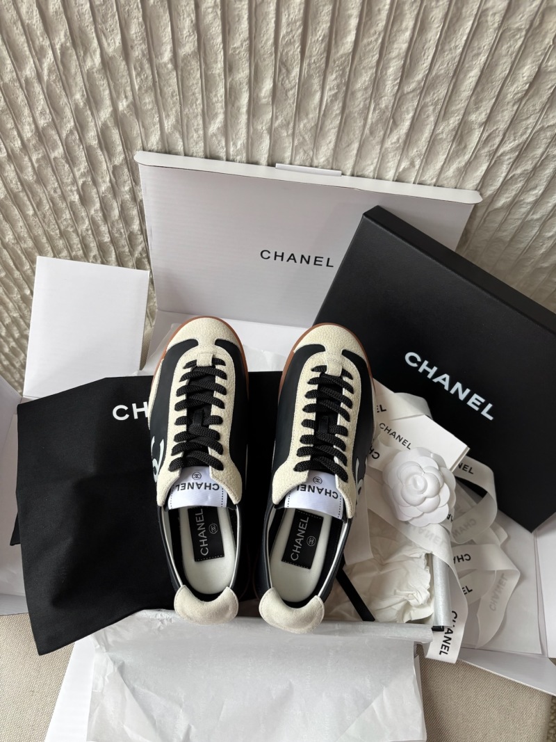 Кроссовки чёрные с белыми вставками Chanel