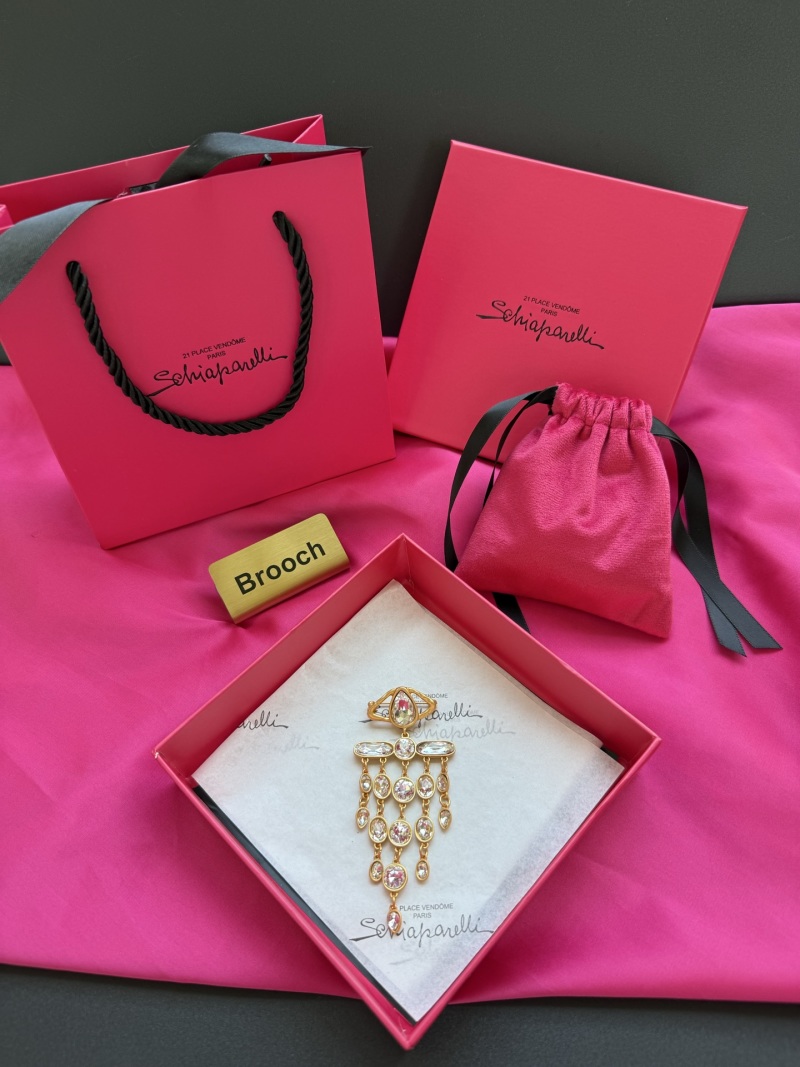 Брошь Schiaparelli