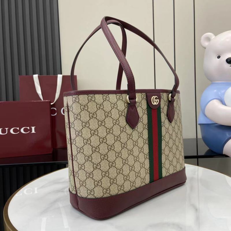 Сумка Gucci с монограммой и кожаной отделкой