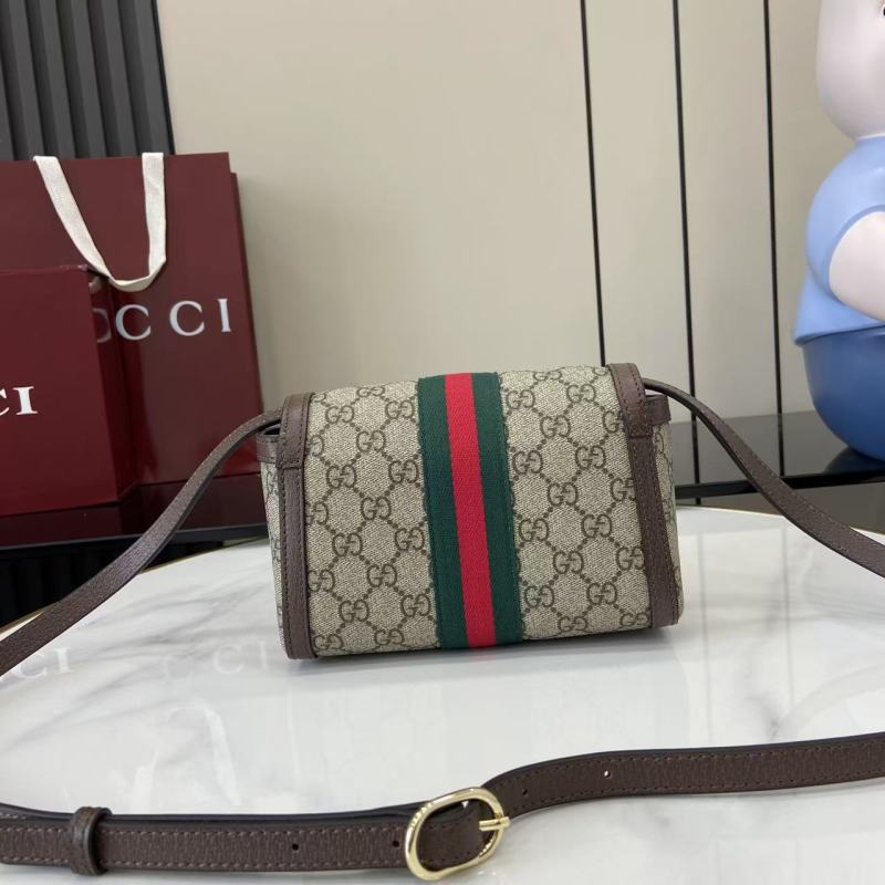 Сумка-клатч Gucci с монограммой и ремешком