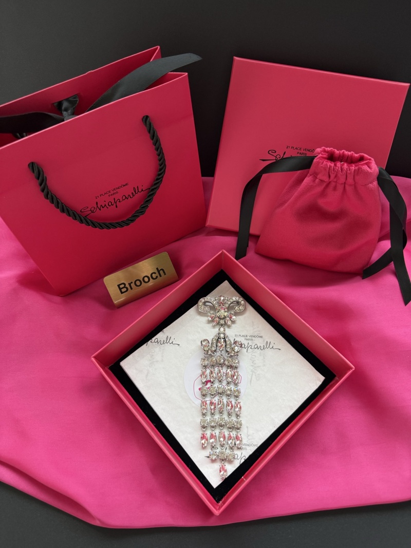 Брошь Schiaparelli