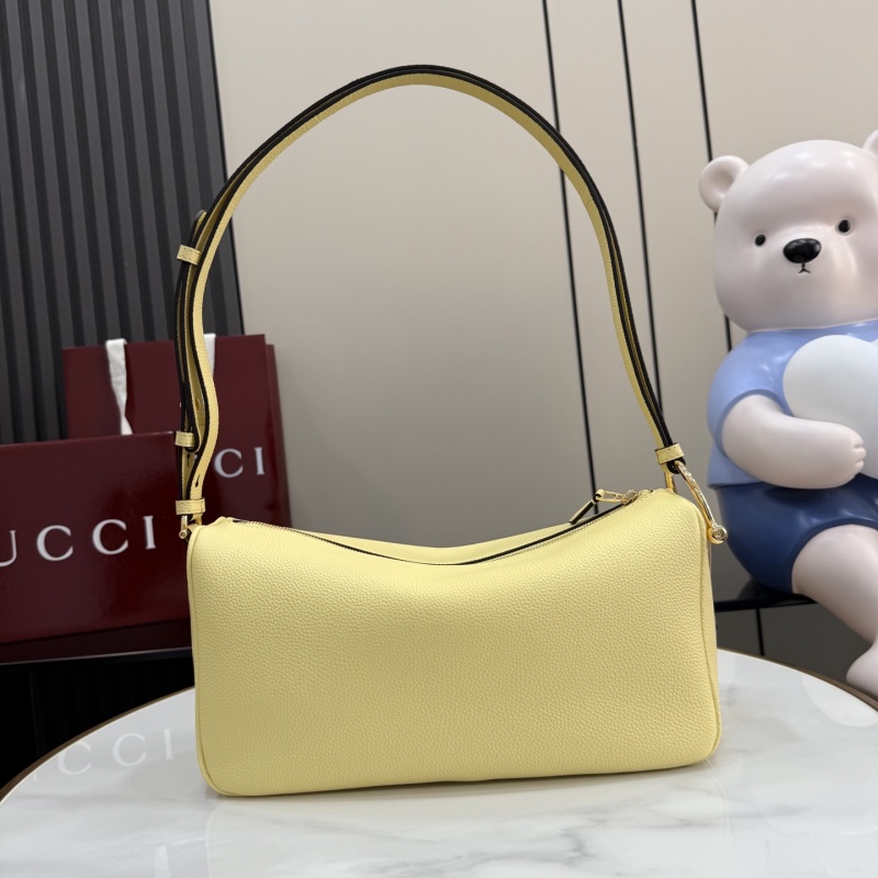 Желтая кожаная сумка Gucci