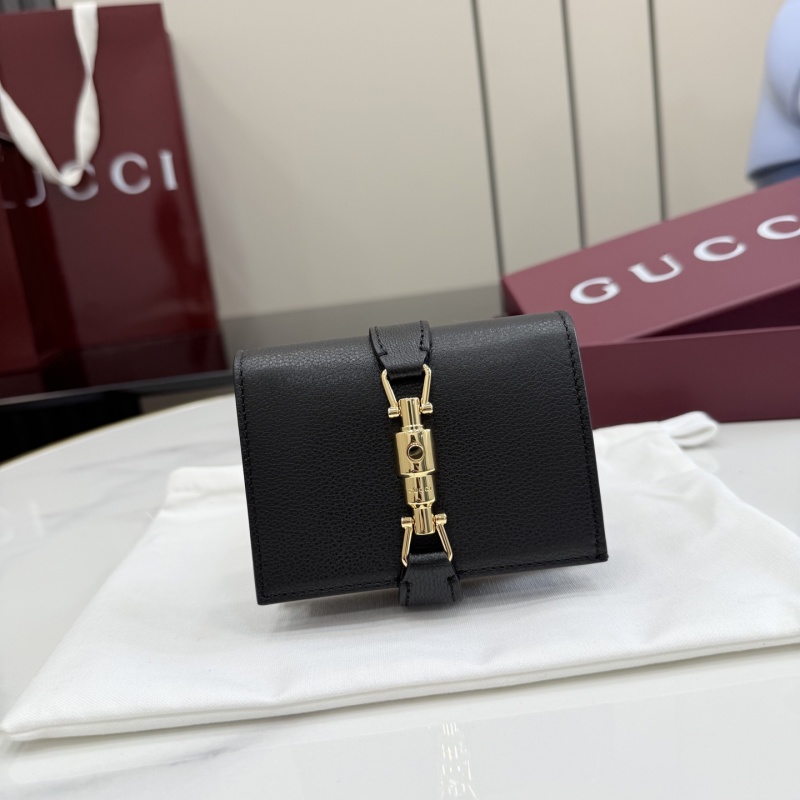 Черное портмоне Gucci с пряжкой