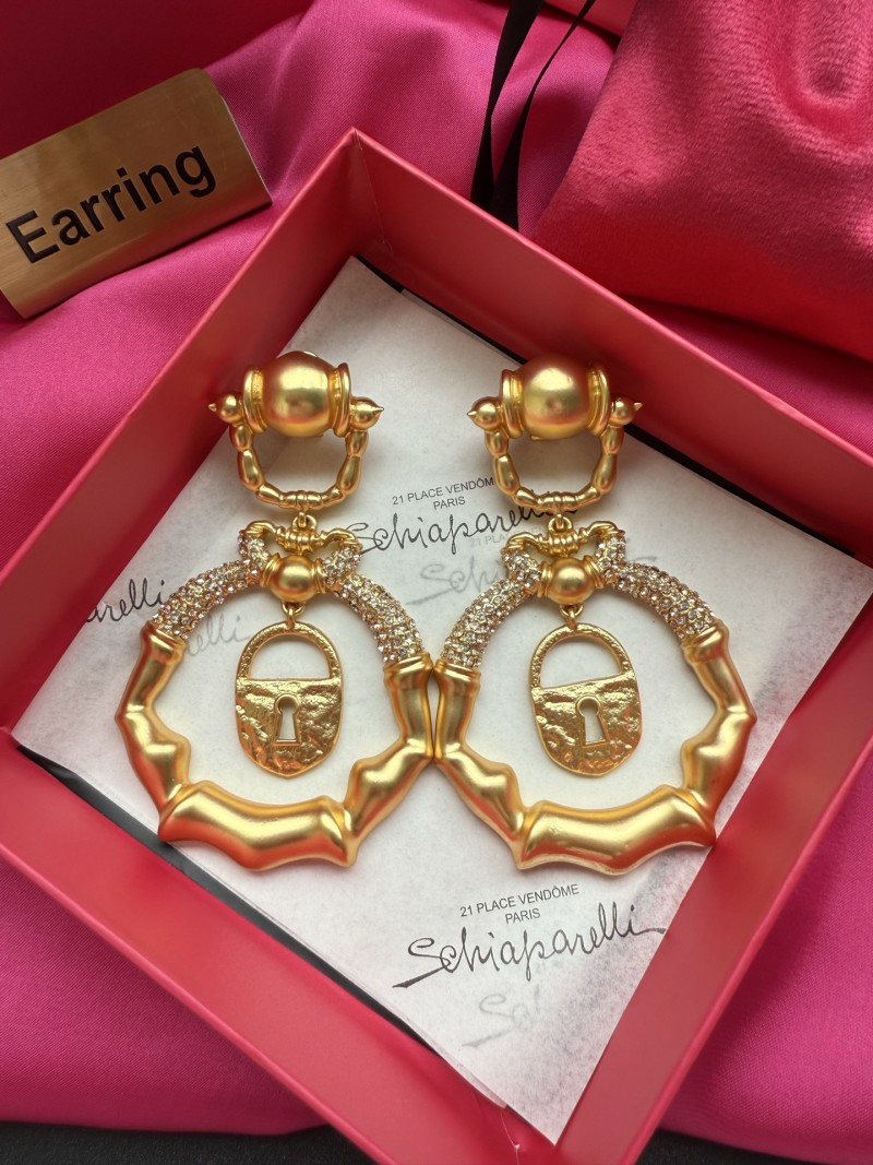 Серьги Schiaparelli с замком