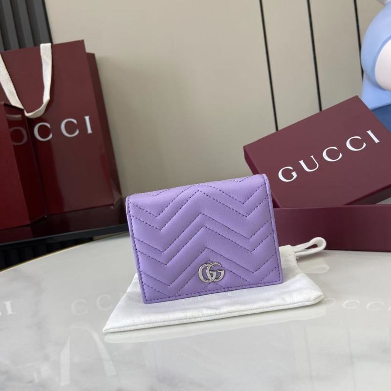 Фиолетовый кошелёк Gucci с логотипом