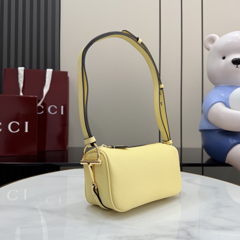 Желтая сумка-клатч Gucci с ремешком