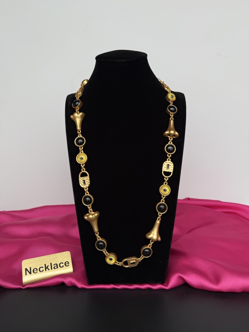 Наручное колье с черными вставками Schiaparelli