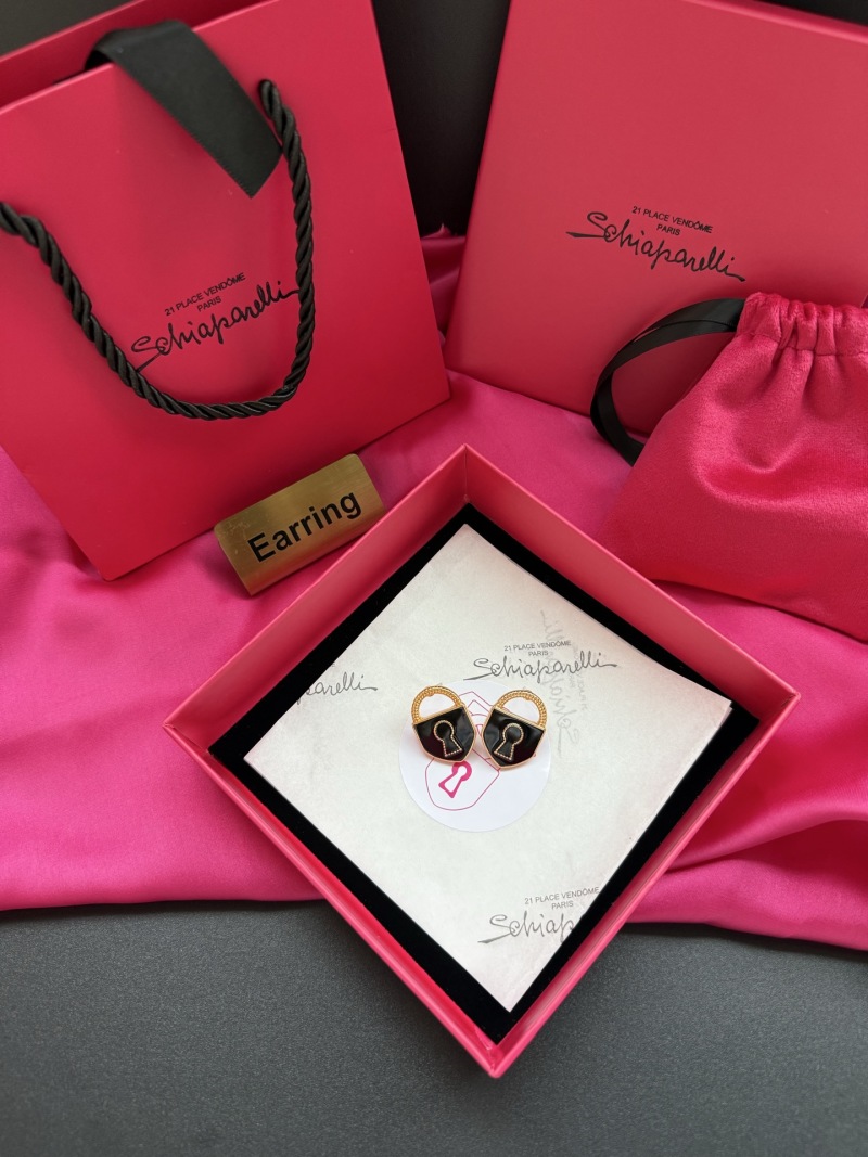 Серьги в виде замков Schiaparelli