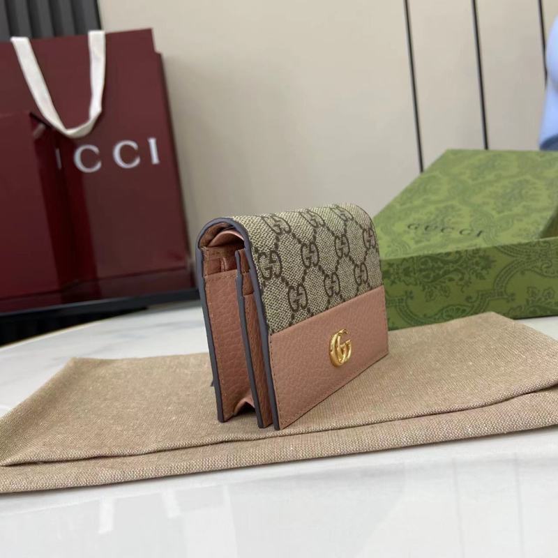 Портмоне Gucci с монограммой и логотипом GG