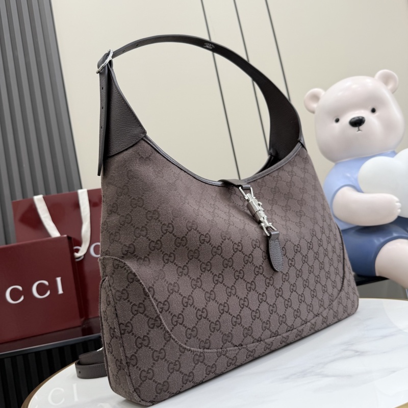 Сумка Gucci с монограммой и ремешком