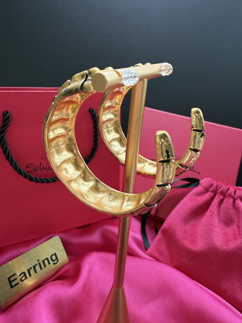 Золотистые серьги с кристаллами Schiaparelli