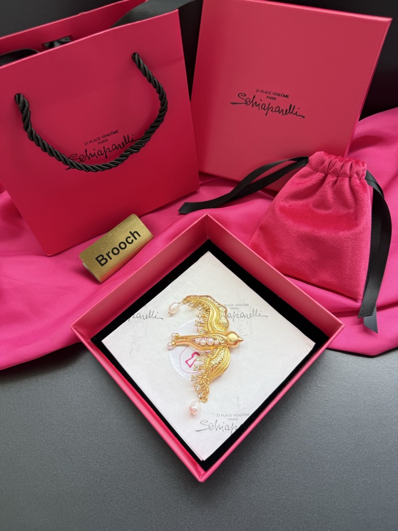 Брошь Schiaparelli в виде птицы
