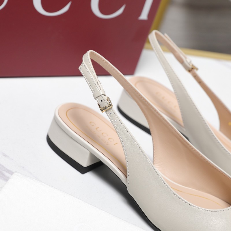 Женские сабо на каблуке с золотой застёжкой Gucci
